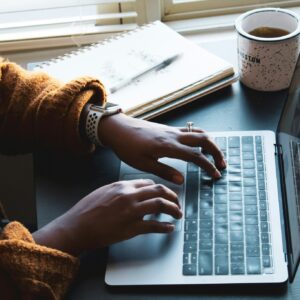 person using black and silver laptop computer